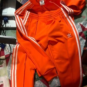 Adidas tracksuit in orange!new! Selling both track jacket and pants set for $90